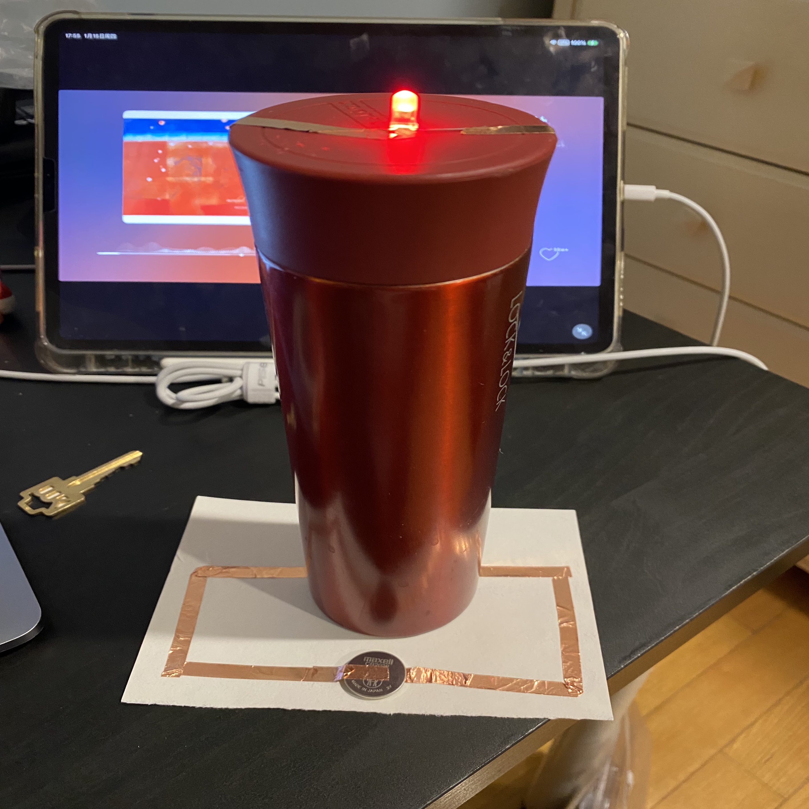 An “lighthouse” made with conductive tape and a water bottle