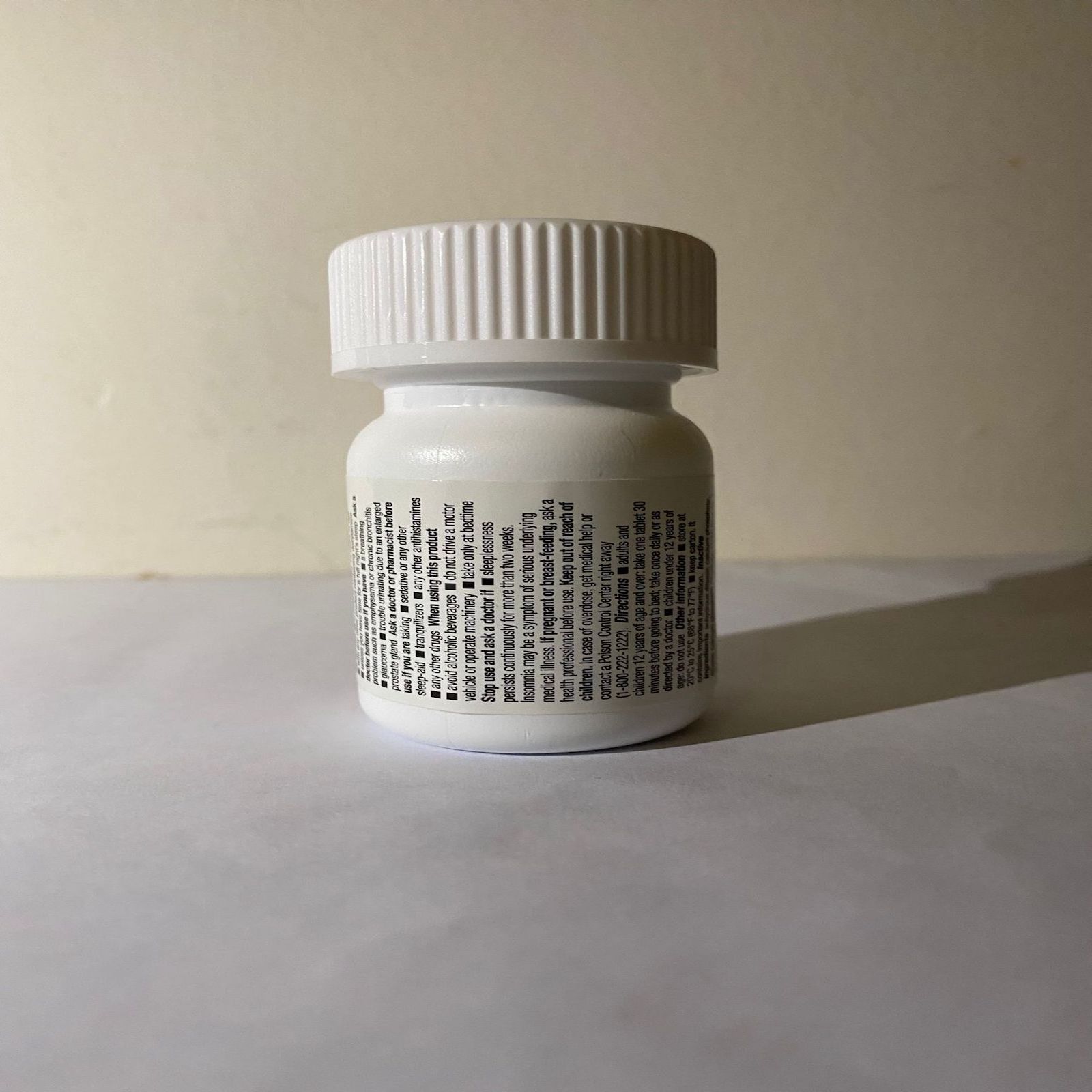 The sound of the bottle of sleeping pills being shaken